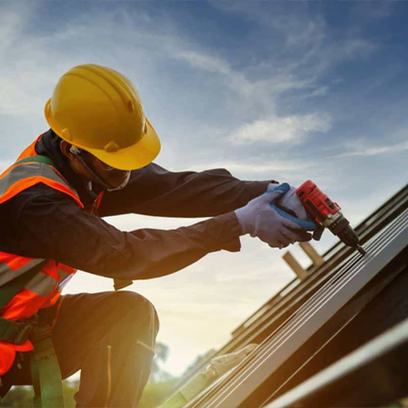 Roofing crew working on a residential roof in Tennessee