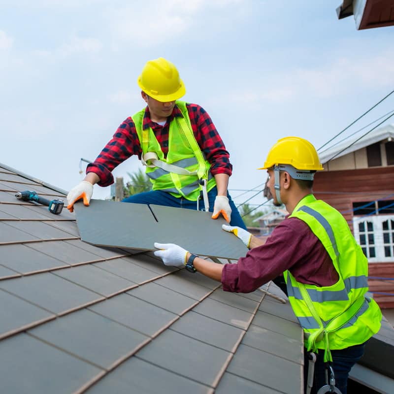 Roofing crew working on a roof in Tennessee